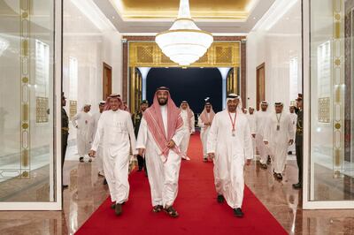 ABU DHABI, UNITED ARAB EMIRATES - December 01, 2019: HH Sheikh Mohamed bin Zayed Al Nahyan, Crown Prince of Abu Dhabi and Deputy Supreme Commander of the UAE Armed Forces (R) bids farewell HRH Prince Mohamed bin Salman bin Abdulaziz, Crown Prince, Deputy Prime Minister and Minister of Defence of Saudi Arabia (C), at the Presidential Airport. Seen with HE Turki Al Dakhil, Ambassador of Saudi Arabia to the UAE (L).

( Mohamed Al Hammadi / Ministry of Presidential Affairs )
---