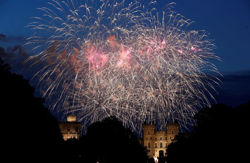 Fireworks explode above Windsor Castle during the lighting of the principal platinum jubilee beacon ceremony during the Queen Elizabeth II's platinum jubilee celebrations in Windsor, Britain, June 2, 2022. Reuters