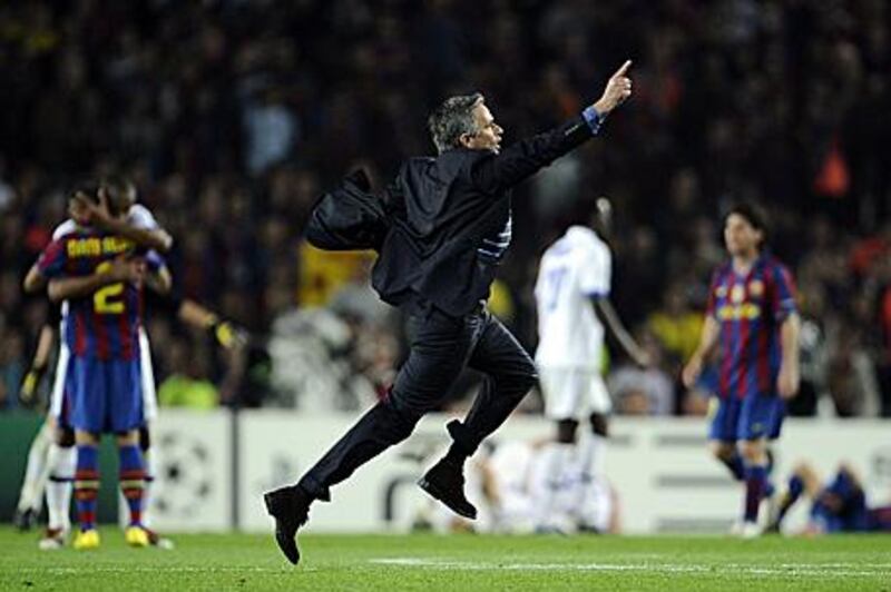 Jose Mourinho celebrates at the final whistle in the Camp Nou after Inter secure their passage to the Champions League final.