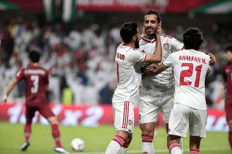 United Arab Emirates' forward Ali Mabkhout al Hajeri celebrates with his teammates after scoring during the AFC Asian Cup group A soccer match between United Arab Emirates and Thailand at Al Maktoum Stadium in Al Ain, United Arab Emirates, Monday, Jan. 14, 2019. (AP Photo/Nariman El-Mofty)