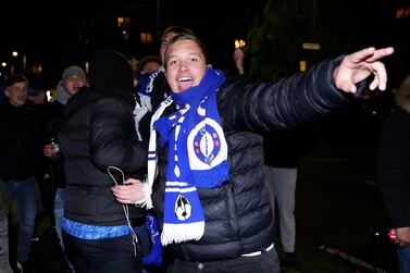 Chelsea fans celebrate outside their Stamford Bridge ground after beating Real Madrid 2-0 in their semi-final second leg and make the Champions League final where they will take on Manchester City. PA