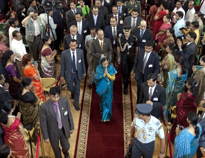 Former Indian president Pratibha Devisingh Patil leaves the Indian Social and Cultural Centre with her husband Devisingh Rnsingh Shekhawat after making a speech in Abu Dhabi on November 22, 2010. Jeff Topping / The National