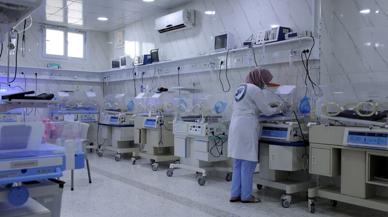 A nurse works in the neonatal intensive care unit at the Avicenna Children's Specialist Hospital in Idlib, Syria. The hospital is operated by the Syrian American Medical Society Foundation. EPA