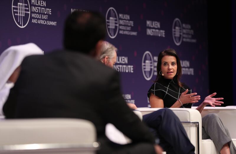 Goldman Sachs partner and former advisor to the Trump administration, Dina Powell, right, speaks during the 2020 Milken Summit.  EPA