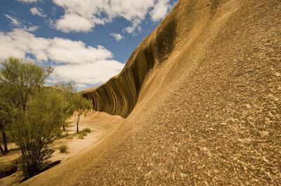 The unique granite formation Wave Rock, located near the Hyden townsite. Courtesy Tourism Western Australia