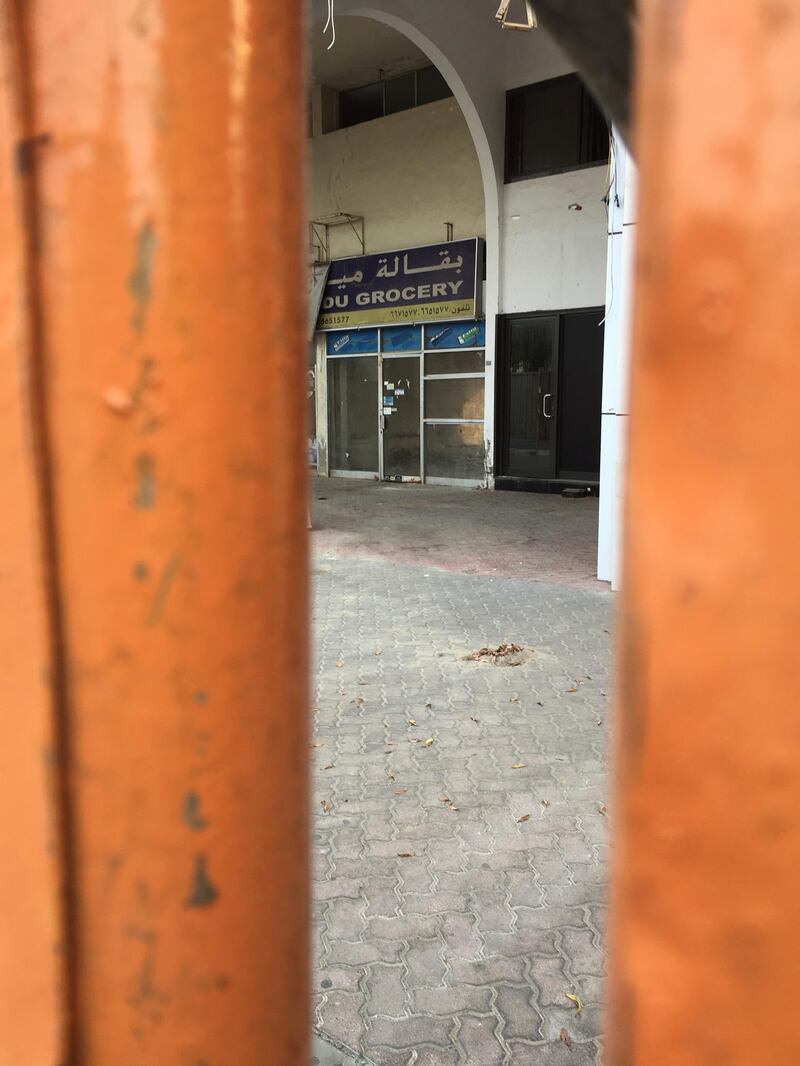 Hoardings were erected around Zaab souq in the past few weeks. John Dennehy / The National