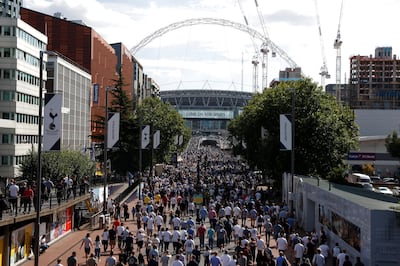 Football Soccer - Premier League - Tottenham Hotspur vs Burnley - London, Britain - August 27, 2017   General view of fans walking towards Wembley stadium before the match   Action Images via Reuters/Matthew Childs    EDITORIAL USE ONLY. No use with unauthorized audio, video, data, fixture lists, club/league logos or "live" services. Online in-match use limited to 45 images, no video emulation. No use in betting, games or single club/league/player publications. Please contact your account representative for further details.
