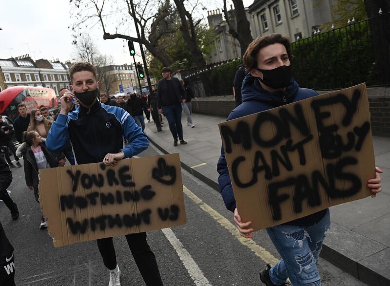 Chelsea fans protesting against the planned European Super League. EPA