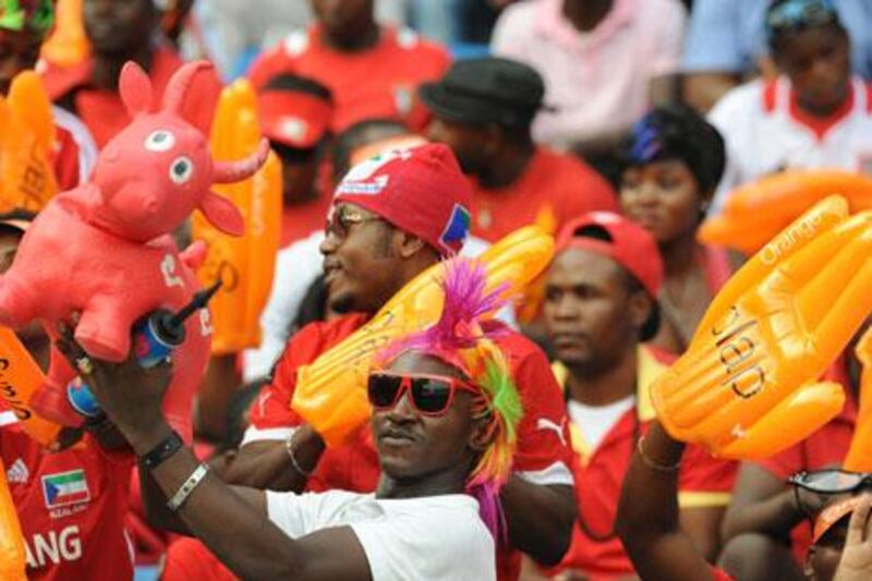Supporters of Equatorial Guinea cheer their team on in Bata during the African Cup of Nations.
