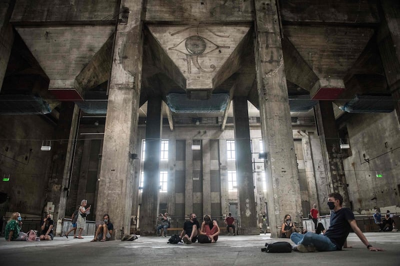 Visitors listen to the sound installation “eleven songs – halle am berghain” at Berghain club in Berlin, Germany. AFP