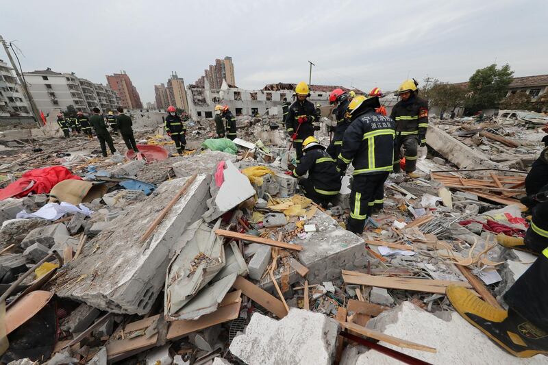 Rescue workers are seen here at the blast site. Reuters