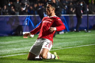 Manchester United's Portugal's forward Cristiano Ronaldo celebrates after scoring his second goal during the UEFA Champions League group F football match between Atalanta and Manchester United at the Azzurri d'Italia stadium, in Bergamo, on November 2, 2021.  (Photo by Marco BERTORELLO  /  AFP)