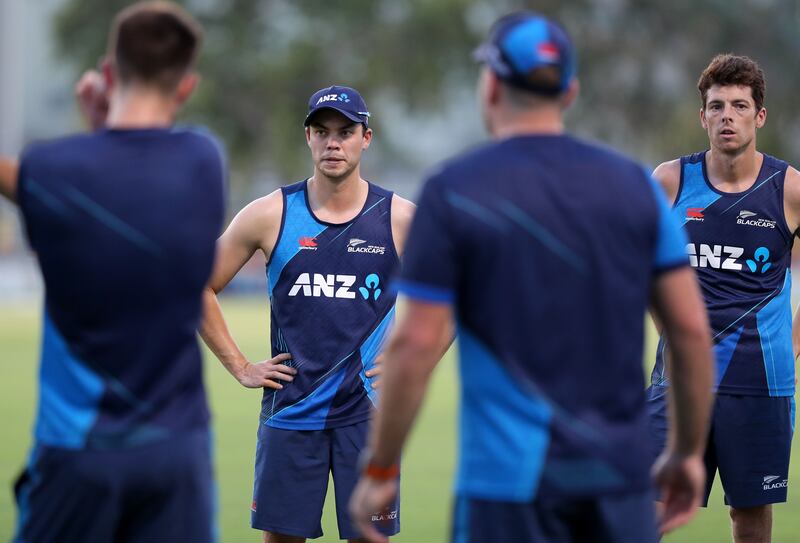 New Zealand's Mark Chapman with teammates.