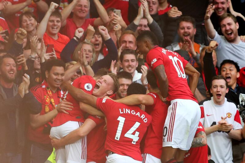 MANCHESTER, ENGLAND - AUGUST 11: Daniel James of Manchester United celebrates with teammates after scoring his team's fourth goal during the Premier League match between Manchester United and Chelsea FC at Old Trafford on August 11, 2019 in Manchester, United Kingdom. (Photo by Julian Finney/Getty Images)