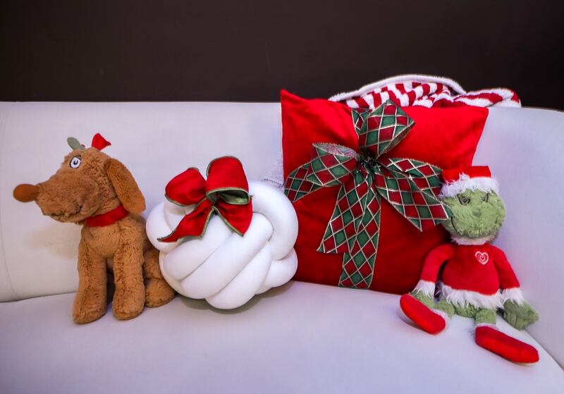 Christmas-themed stuffed toys and pillows 