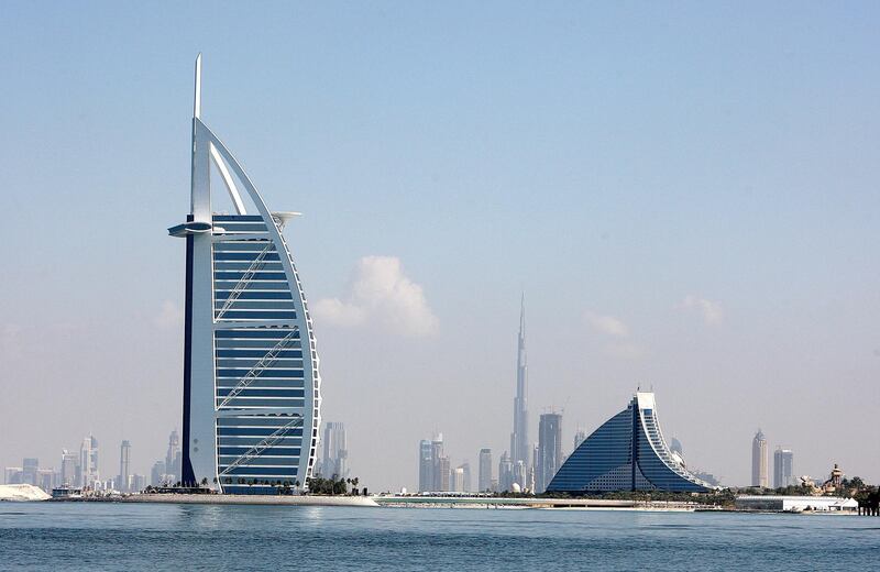 DUBAI, UNITED ARAB EMIRATES – Dec 21: View of the Burj Al Arab hotel (left), Jumeirah Beach hotel (right) and Burj Dubai (center) in Dubai. (Pawan Singh / The National) For Stock
