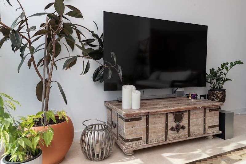 The television is one of the only newly bought items in the house