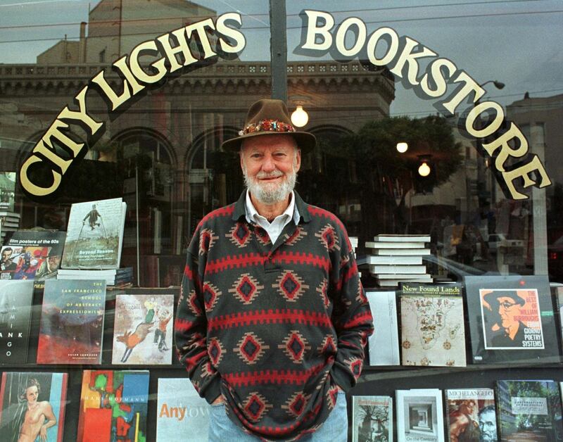 FILE PHOTO: Lawrence Ferlinghetti stands outside his bookstore in San Francisco, California, U.S. August 18, 1998. Stringer/File Photo