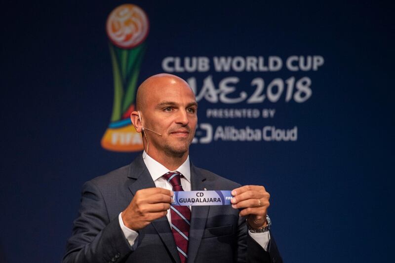 Former Argentine footballer Esteban Cambiasso displays the name of CD Guadalajara during the Official Draw for the FIFA Club World Cup UAE 2018 on Tuesday, September 4, 2018, at the FIFA headquarters in Zurich, Switzerland. (Ennio Leanza/Keystone via AP)