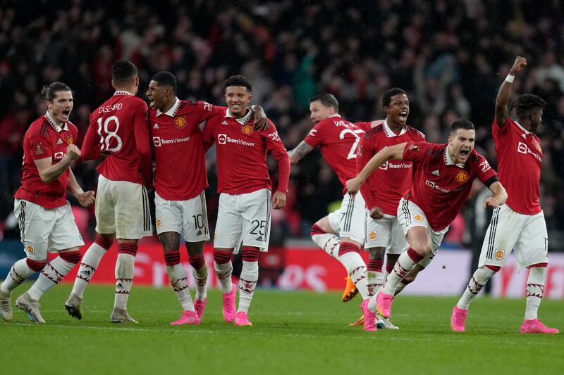 Manchester United players celebrate after winning the FA Cup semi-final against Brighton and Hove Albion at Wembley Stadium. AP