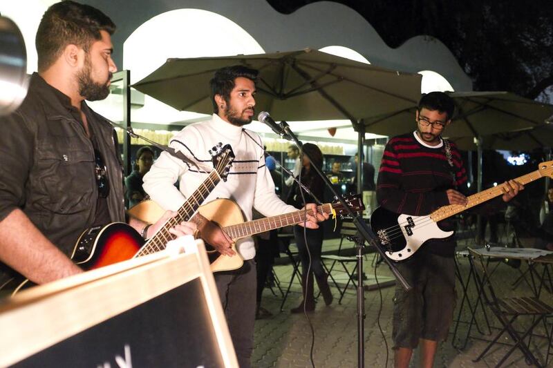 The band Physical Graffiti plays at a Freshly Ground Sounds acoustic night held at The Archive in Safa Park. Razan Alzayani / The National 