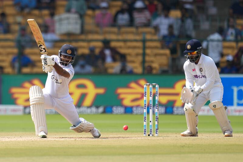 Sri Lanka captain Dimuth Karunaratne plays a shot on his way to a defiant 107 off 174 balls. AP