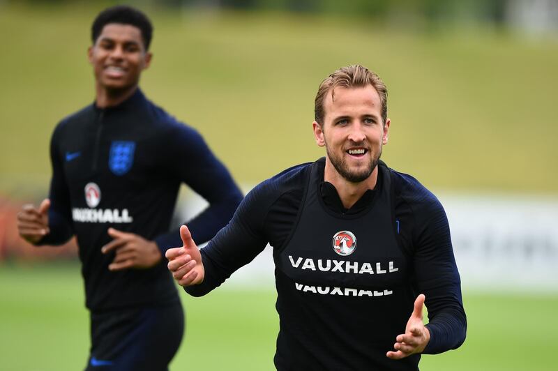 Harry Kane reacts during a training session at St Georges Park on May 28, 2018 in Burton-upon-Trent, England. Nathan Stirk / Getty Images