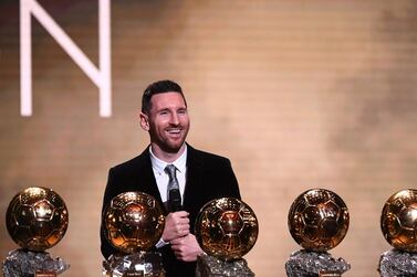 TOPSHOT - Barcelona's Argentinian forward Lionel Messi reacts after winning the Ballon d'Or France Football 2019 trophy at the Chatelet Theatre in Paris on December 2, 2019. Lionel Messi won a record-breaking sixth Ballon d'Or on Monday after another sublime year for the Argentinian, whose familiar brilliance remained undimmed even through difficult times for club and country. / AFP / FRANCK FIFE