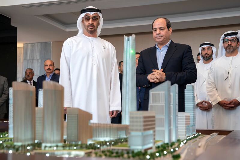 AL ALAMEIN, EGYPT - March 28, 2019: HH Sheikh Mohamed bin Zayed Al Nahyan, Crown Prince of Abu Dhabi and Deputy Supreme Commander of the UAE Armed Forces (4th R) and HE Abdel Fattah El Sisi President of Egypt (3rd R), inspect projects at Al Alamein city. Seen with HH Sheikh Hamed bin Zayed Al Nahyan, Chairman of the Crown Prince Court of Abu Dhabi and Abu Dhabi Executive Council Member (R) and HE Mohamed Mubarak Al Mazrouei, Undersecretary of the Crown Prince Court of Abu Dhabi (2nd R).

( Mohamed Al Hammadi / Ministry of Presidential Affairs )
---