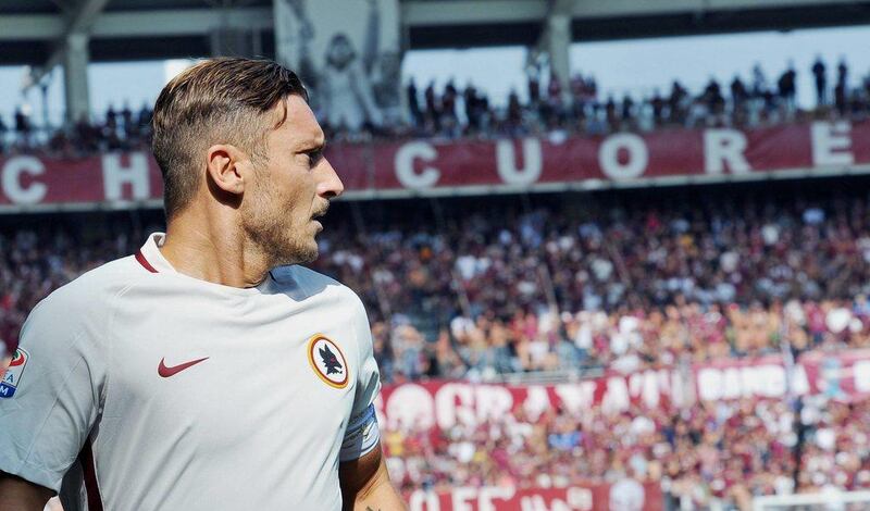 Roma's Francesco Totti walks on the pitch during a Serie A soccer match between Roma and Torino at the Turin Olympic stadium, Italy, Sunday, Sept. 25, 2016. Alessandro Di Marco / AP