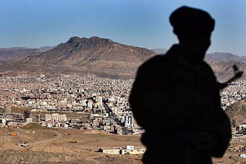 A Yemeni soldier stands guard near the capital Sana’a. Significant gold finds could boost the country’s revenues.