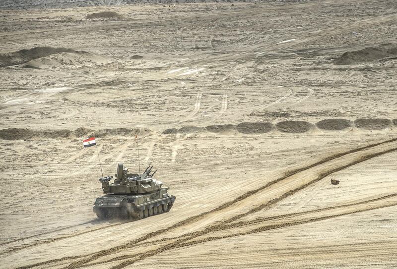 An Egyptian tank takes part in the Arab Shield military exercises in the Matrouh Governorate Mohamed Naguib miilitary base, northwest of the capital Cairo on November 15, 2018. - Forces from Saudi Arabia, Egypt, the UAE, Kuwait, Bahrain and Jordan are taking part in the maneuvers. (Photo by Khaled DESOUKI / AFP)