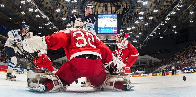 Denmark goalie Sebastian Dahm saves a shot during the quarter-final game against Finland at the 2016 IIHF Ice Hockey World Championship in Saint Petersburg. Finland won the match 5-1. Vesa Koivunen / AFP