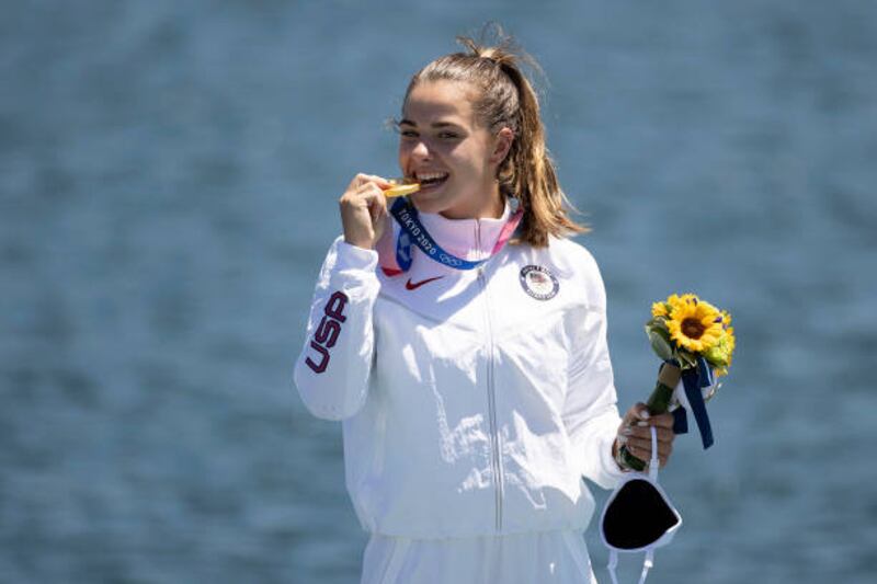 Gold medalist Nevin Harrison of Team United States celebrates at the medal ceremony following the Women's Canoe Single 200m Final.