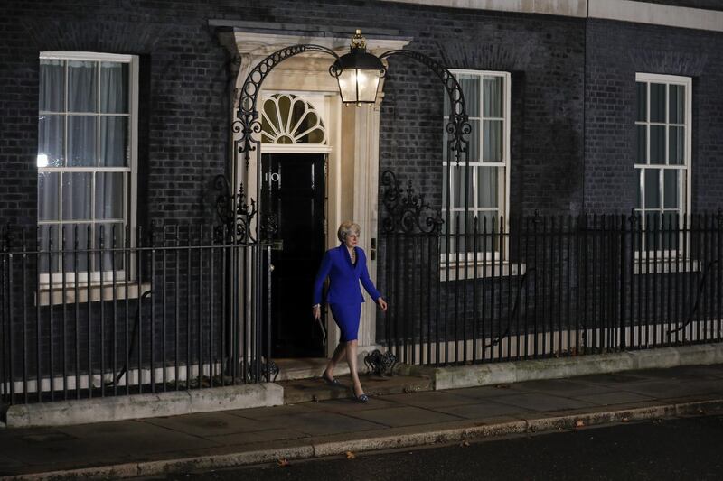 Theresa May walks out to deliver a speech, after winning a confidence vote. Luke MacGregor/Bloomberg