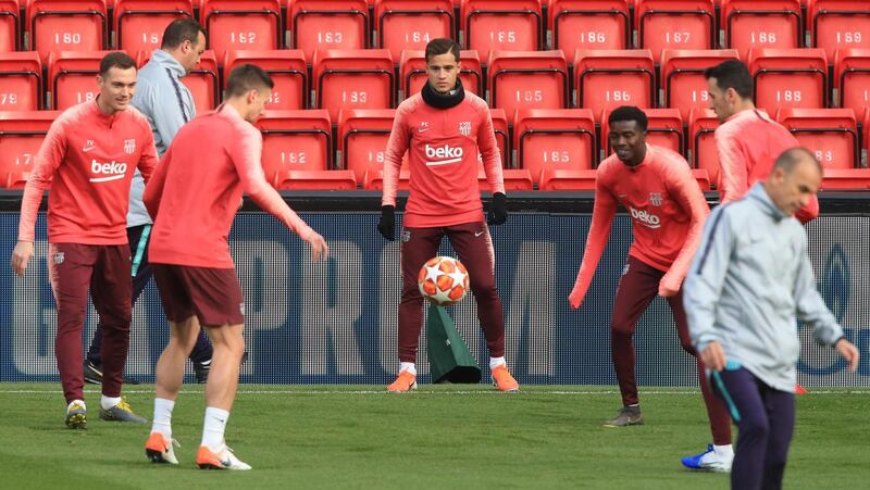 Barcelona midfielder Philippe Coutinho, centre, takes part in training at Anfield ahead of the Uefa Champions League semi-final, second leg against Liverpool. AFP