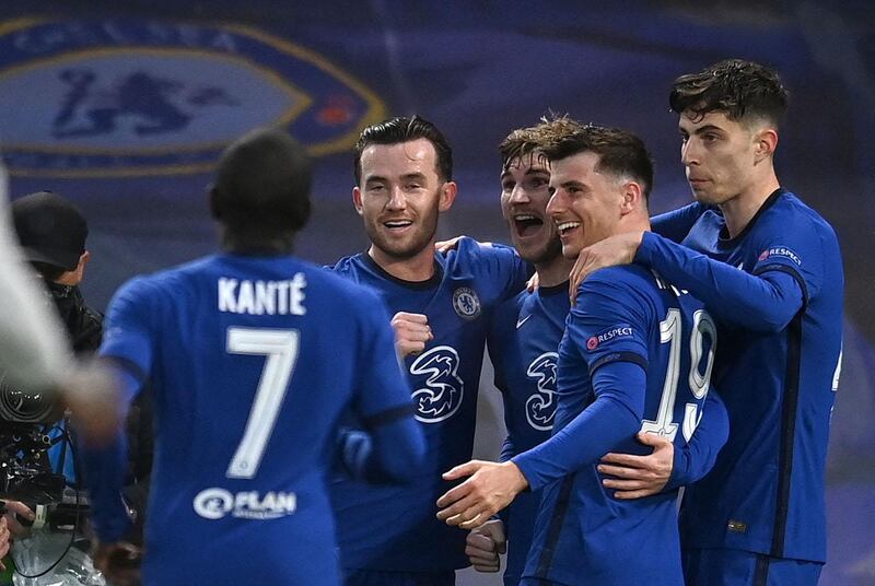 Chelsea's German striker Timo Werner (3R) celebrates scoring the opening goal during the UEFA Champions League second leg semi-final football match between Chelsea and Real Madrid at Stamford Bridge in London on May 5, 2021. (Photo by Glyn KIRK / AFP)