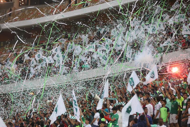 Al-Ahli fans attend a Zayed Champions Cup soccer match between Al-Ahli and Al-Hilal at King Abdullah International Stadium AlJawhra, Jeddah, Saudi Arabia. EPA