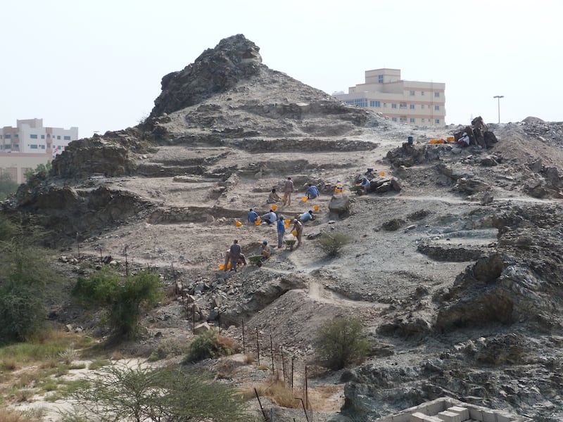 Archaeologists work at Masafi 5 in 2017. There are several ancient settlements at Masafi, a town in the foothills of the UAE's Hajar Mountains. Photo: French Archaeological Mission in the UAE