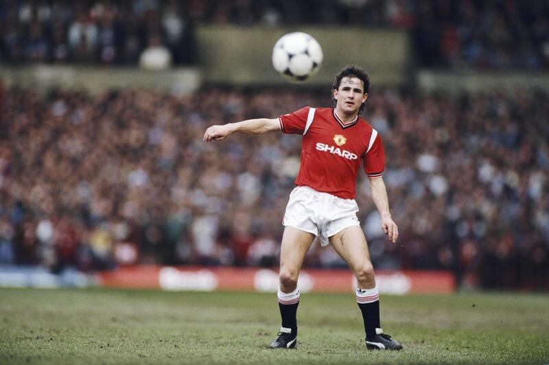 MANCHESTER, UNITED KINGDOM - MARCH 01:  Manchester United defender Arthur Albiston passes an adidas tango football during a League Division One match against Manchester City at Old Trafford in March 1986 in Manchester, England.  (Photo by Allsport/Getty Images)