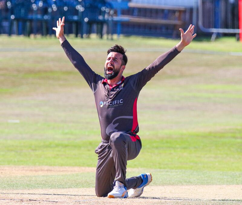 UAE bowler Rohan Mustafa successfully appeals for lbw to dismiss Steven Taylor. 