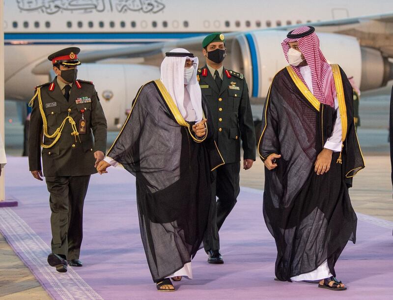 Kuwait's crown prince, Sheikh Meshal al-Ahmad, is received by Saudi Crown Prince Mohammed Bin Salman upon his arrival to Riyadh, Saudi Arabia, June 1, 2021. Bandar Algaloud/Courtesy of Saudi Royal Court/Handout via REUTERS ATTENTION EDITORS - THIS PICTURE WAS PROVIDED BY A THIRD PARTY