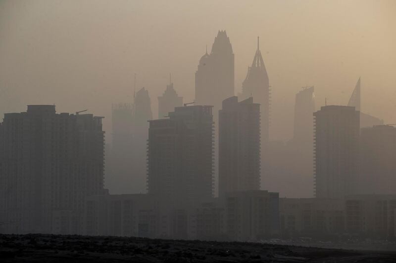 DUBAI, UNITED ARAB EMIRATES, 10 MAY 2017. Standalone photo. As summer temperatures rise visibility drops in the UAE as seen in the dusty sunset over Al Barsha Heights and the Greens. Today saw a heat index of 41 degrees with humidity of 60% while visibility was limited to 4km's. (Photo: Antonie Robertson/The National) ID: STANDALONE. Journalist: None. Section: National. *** Local Caption ***  AR_1005_Standalone_Weather-02.JPG