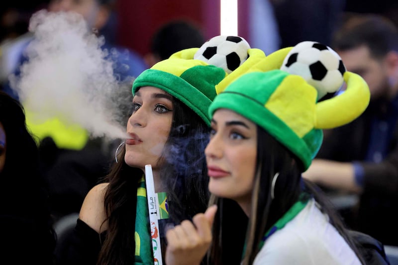 Lebanese fans supporting Brazil during their World Cup match against Switzerland, in Sabtiyeh, north of Beirut AFP