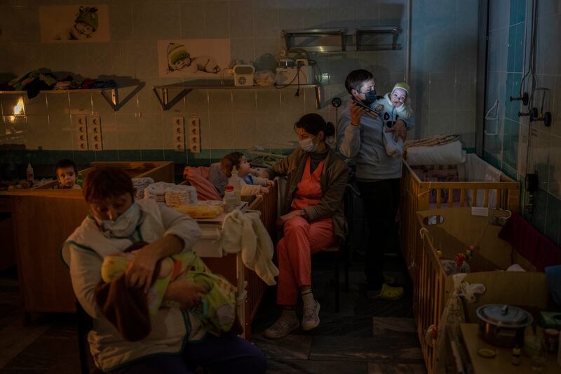 Hospital staff in Kherson with orphaned children at the regional hospital maternity ward in November 2022
