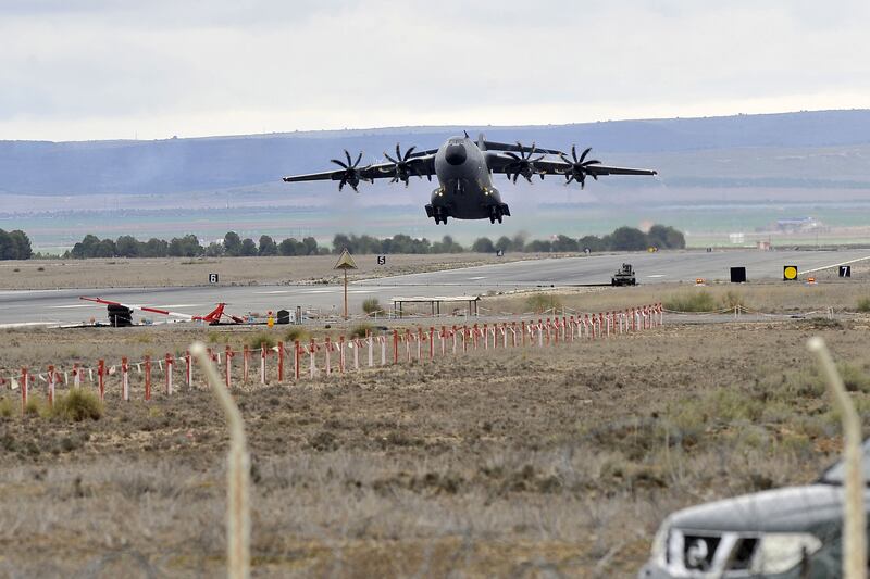 A plane loaded with military equipment for Ukrainian forces takes off from Albacete, Spain. EPA