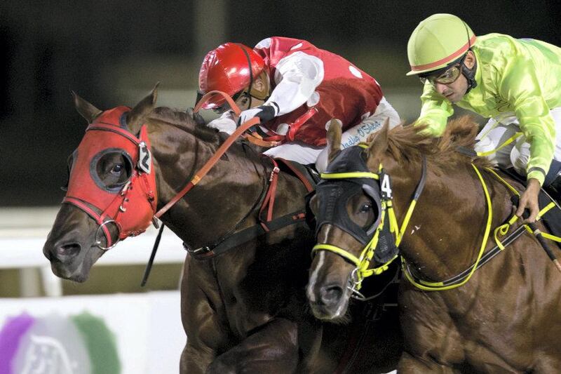 Eric Lemartinel and Tadhg O'Shea combined to win in Abu Dhabi again - this time aboard Asyyad. Erika Rasmussen for The National