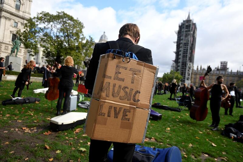 Musicians perform near the houses of Parliament. Reuters