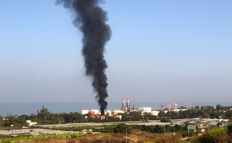 The blaze sent a plume of black smoke into the sky. AFP