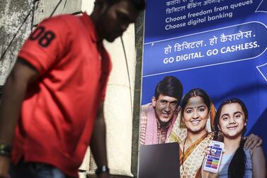 A central bank advertisment in Mumbai. The Covid-19 pandemic has helped to boost the acceptance of many FinTech platforms in India, analysts say. Bloomberg via Getty Images
